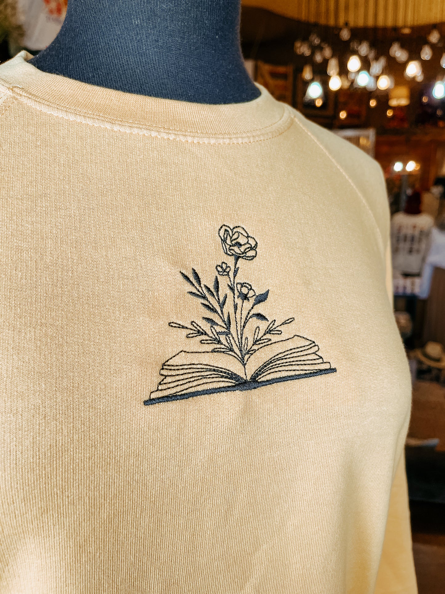 Floral Book Embroidered Crew Sweatshirt