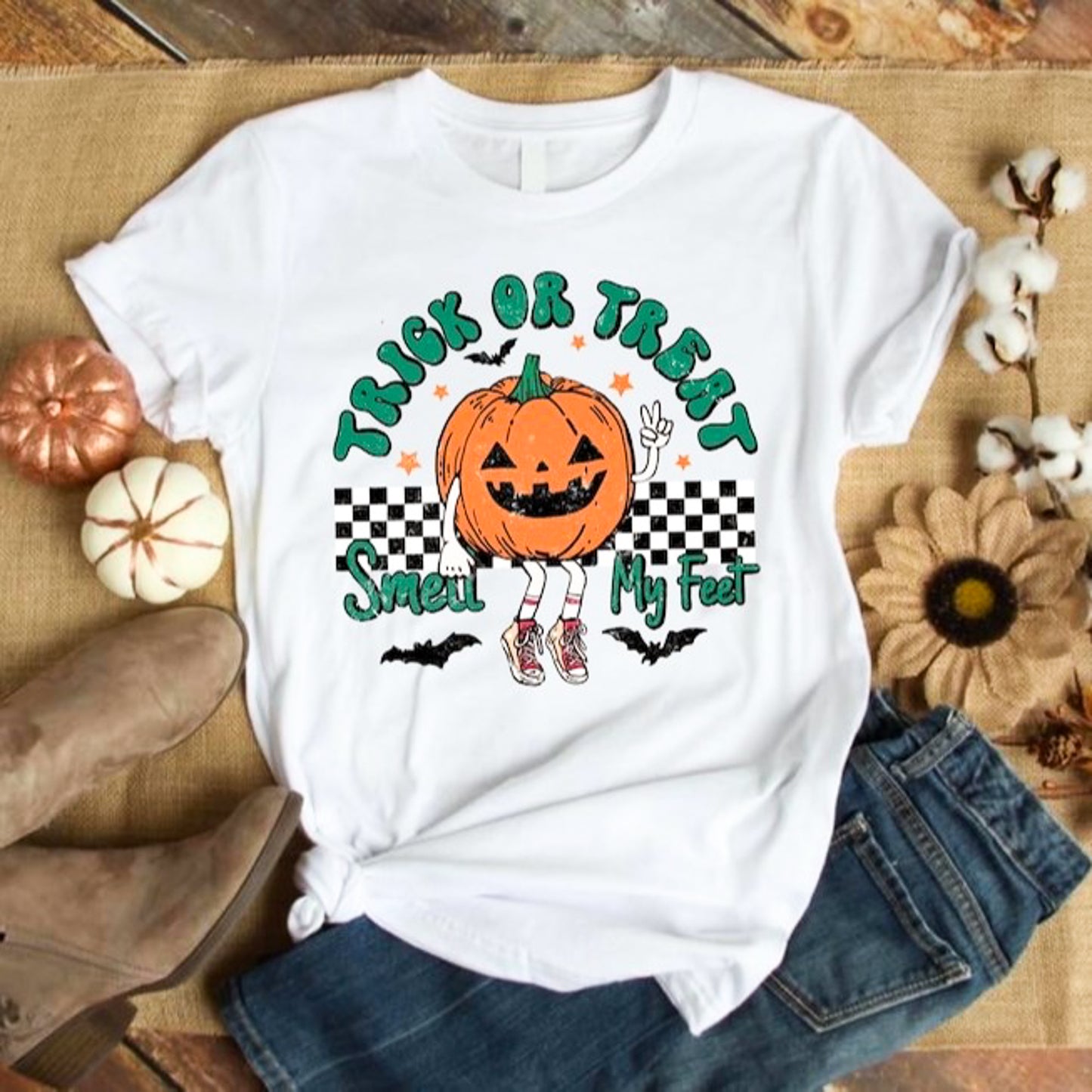 Trick Or Treat Smell My Feet Pumpkin With Checkered Background Tee