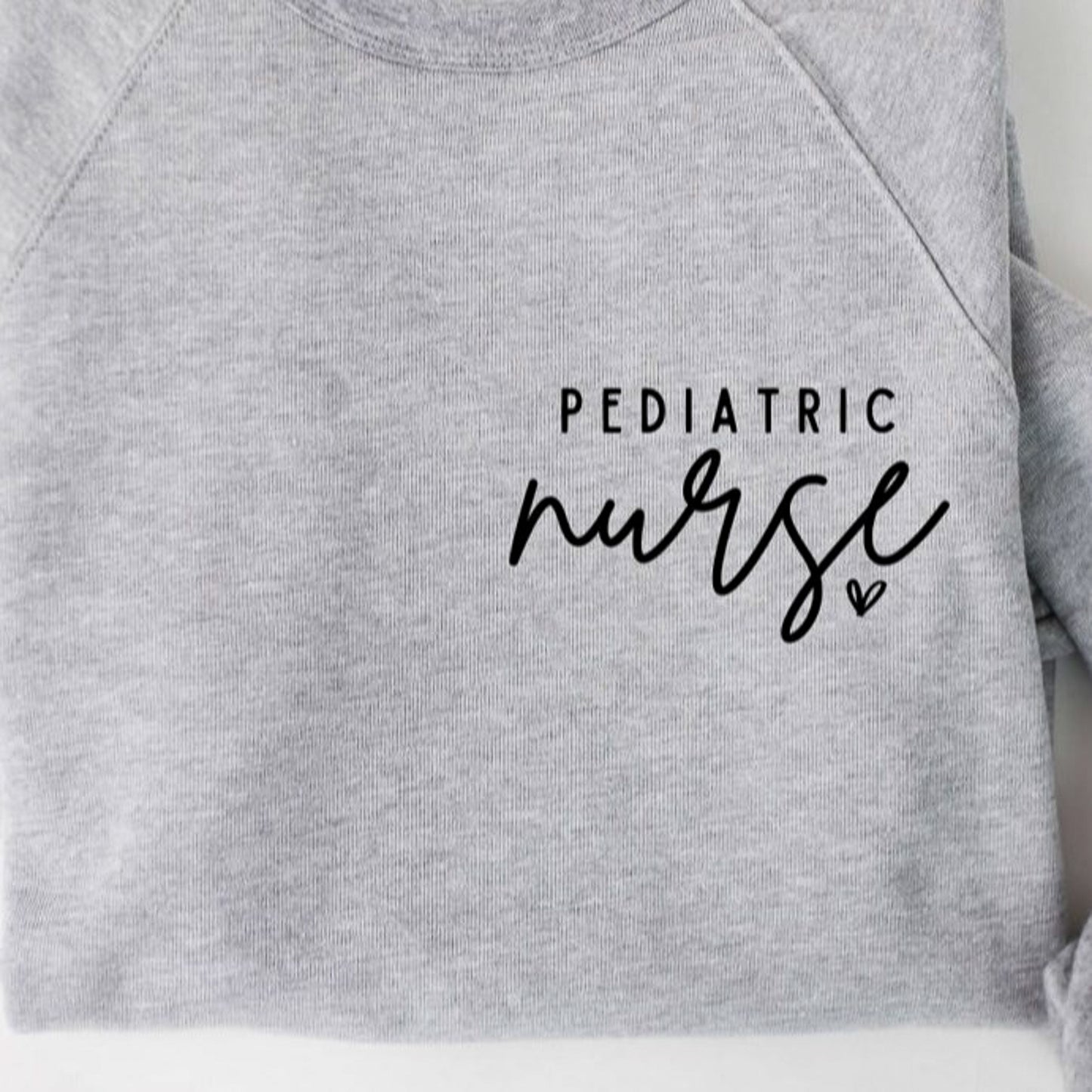 Pediatric Nurse Heart Pocket Logo Crew Sweatshirt
