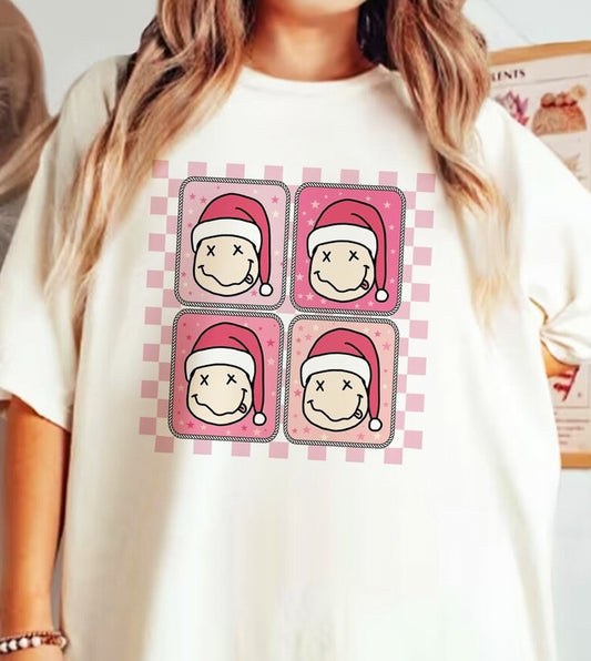 4 Smiley Santas Checkered Background Tee