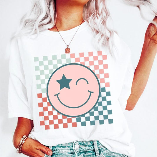 Star Eyed Winking Smiley Face With Checkered Background Tee