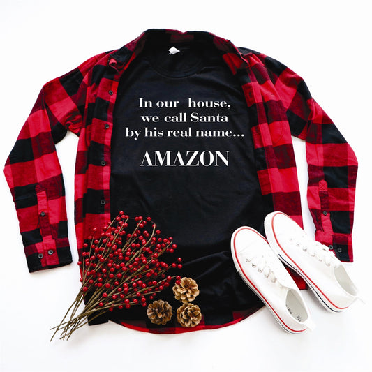 In Our House We Call Santa By His Real Name Amazon Tee