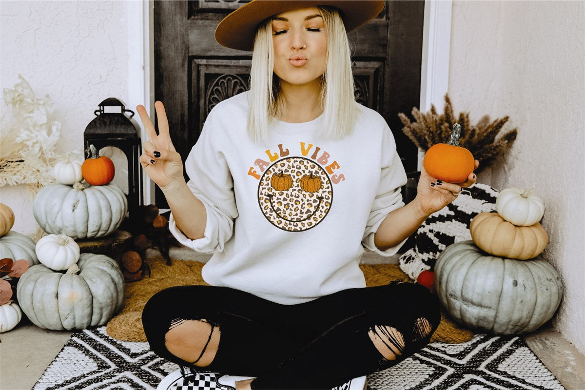 Fall Vibes Leopard Print Smiley Face With Pumpkin Eyes Crew Sweatshirt