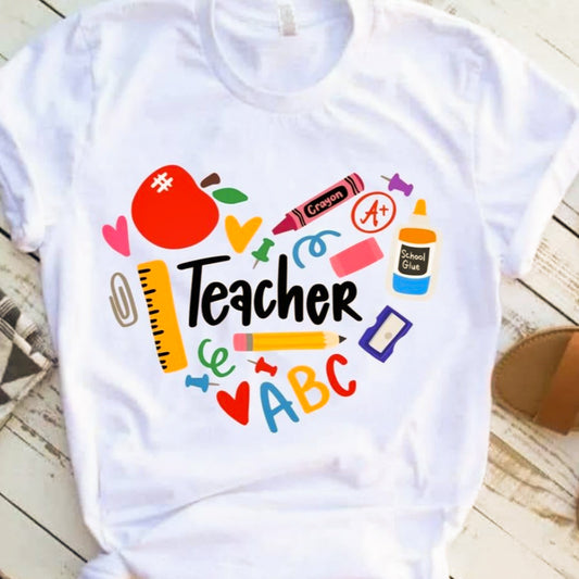 Teacher In Heart With School Supplies Tee